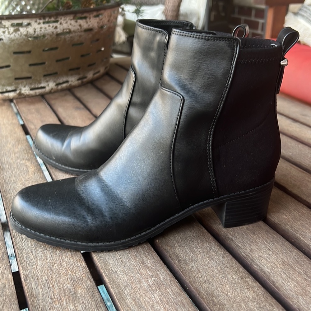 Unisa black ankle boots with side zipper & stretchy material on back.